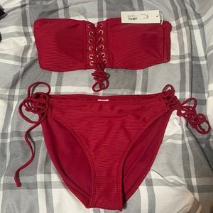 Burgundy strapless swim top with cheeky bottoms